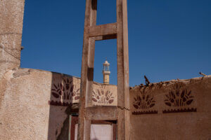 A mosque mausoleum in Aswan, Egypt, seen through the frame of an archway or window