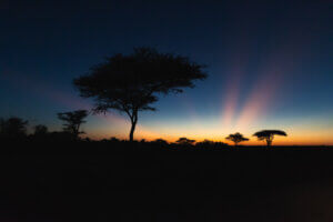 A photo of a breathtaking sunset in the Omo Valley, Ethiopia, symbolically closing the bull-jumping ceremony